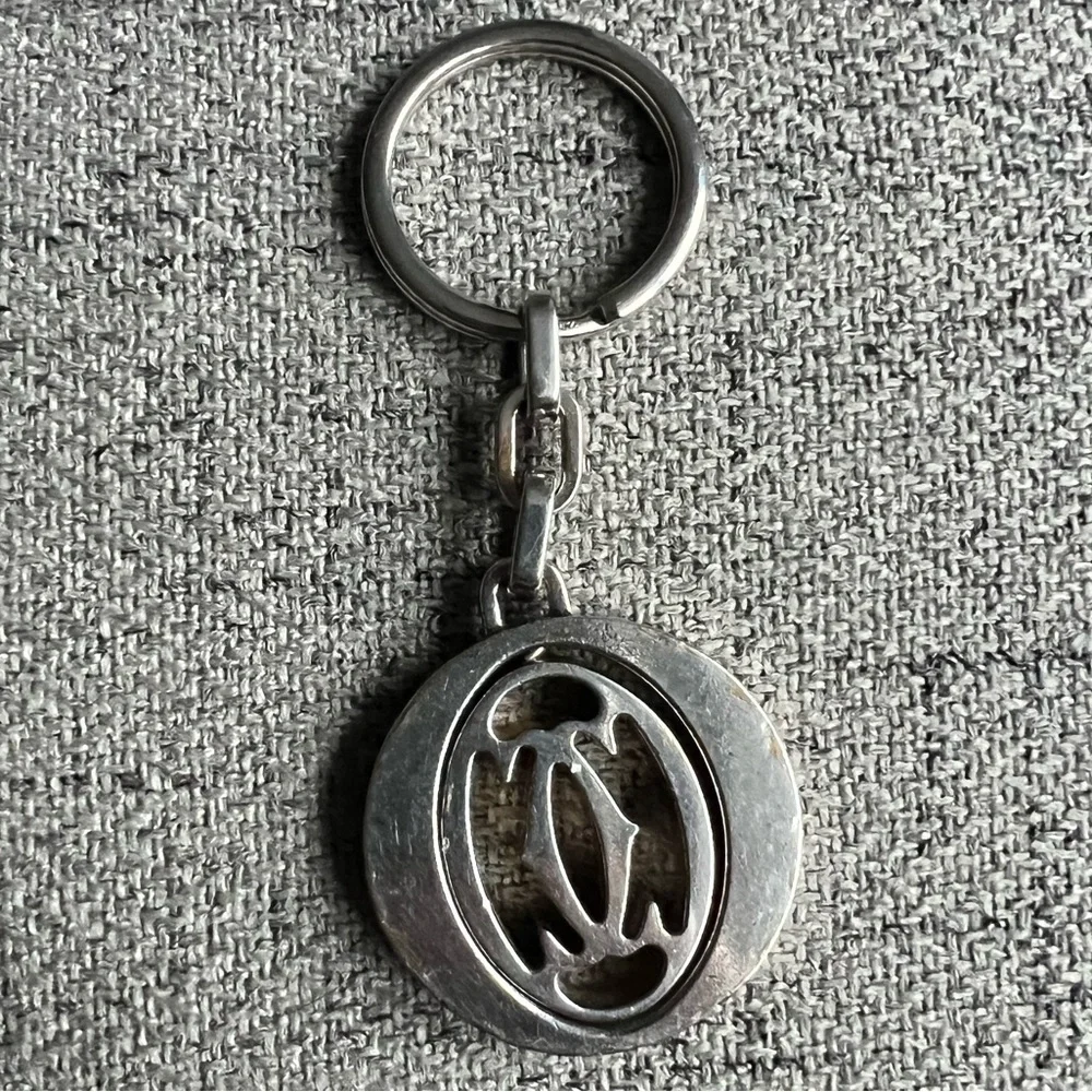 Cartier Silvertone stainless steel pivoting Double C key ring
